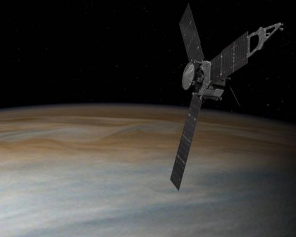 This artist's concept illustrates Juno in orbit over Jupiter. 